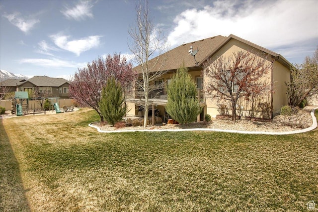 2630 E Riley Dr N, Eagle Mountain, UT 84005 - view of yard featuring a playground