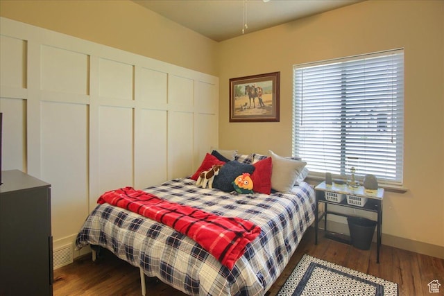 2630 E Riley Dr N, Eagle Mountain, UT 84005 - bedroom with baseboards, wood finished floors, and a closet