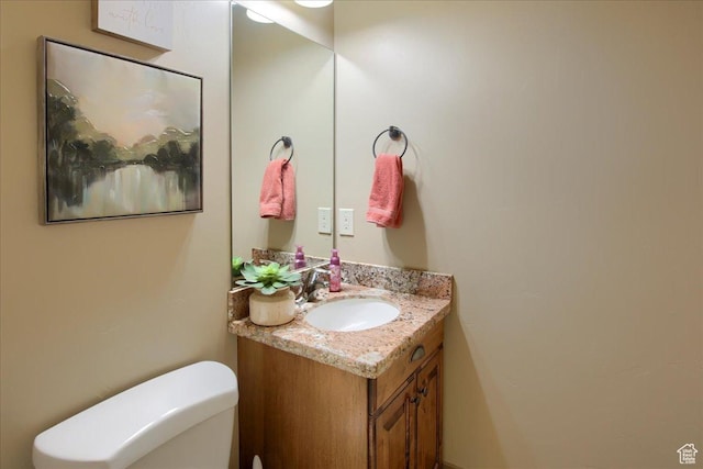 2630 E Riley Dr N, Eagle Mountain, UT 84005 - half bathroom featuring vanity and toilet