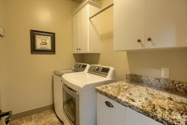 2630 E Riley Dr N, Eagle Mountain, UT 84005 - clothes washing area with cabinet space, independent washer and dryer, and baseboards