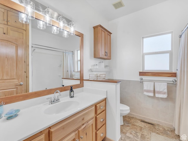 1055 N 1000 E, Mapleton, UT 84664 - bathroom with toilet, vanity, a shower with shower curtain, and visible vents