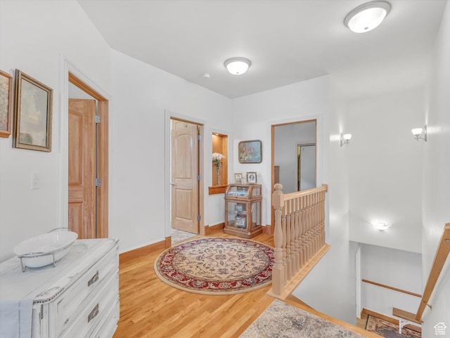 1055 N 1000 E, Mapleton, UT 84664 - hallway featuring light wood-type flooring, baseboards, and an upstairs landing