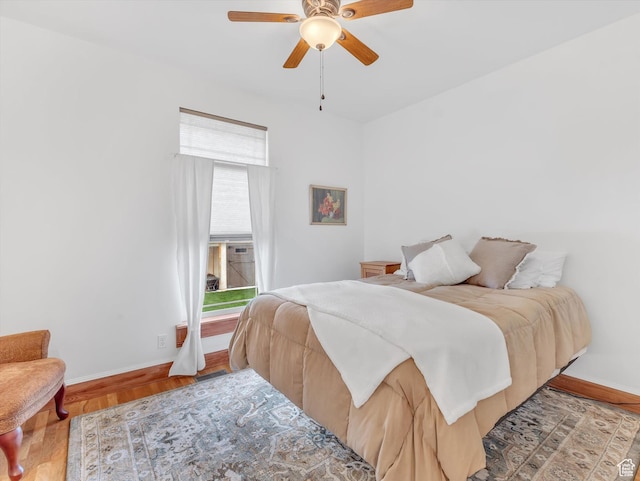 1055 N 1000 E, Mapleton, UT 84664 - bedroom with wood finished floors, a ceiling fan, and baseboards