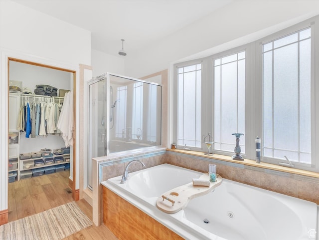 1055 N 1000 E, Mapleton, UT 84664 - full bathroom with a whirlpool tub, a wealth of natural light, a walk in closet, and a stall shower