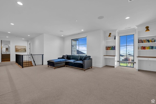 565 W Autumn Blaze, Woodland Hills, UT 84653 - living area featuring light colored carpet, baseboards, and recessed lighting