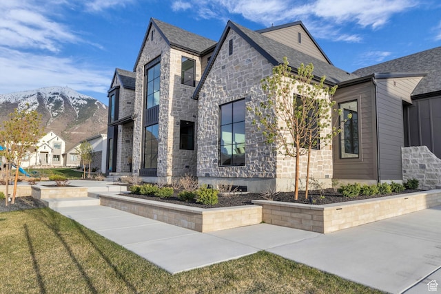 565 W Autumn Blaze, Woodland Hills, UT 84653 - view of front facade with stone siding and a mountain view