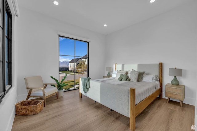 565 W Autumn Blaze, Woodland Hills, UT 84653 - bedroom with baseboards, recessed lighting, and light wood-style floors