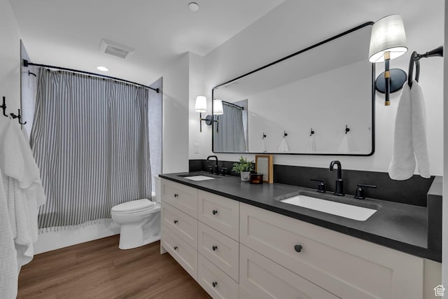 565 W Autumn Blaze, Woodland Hills, UT 84653 - full bath with wood finished floors, visible vents, toilet, and a sink