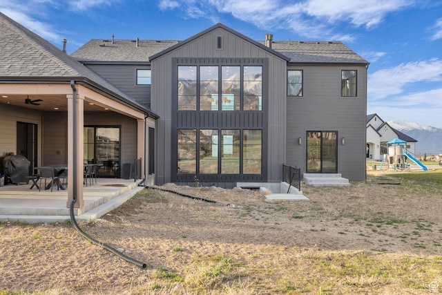 565 W Autumn Blaze, Woodland Hills, UT 84653 - back of house featuring ceiling fan, a playground, roof with shingles, and a patio