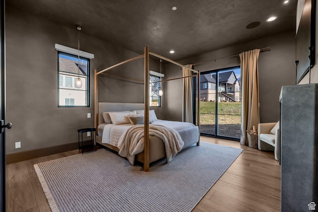 565 W Autumn Blaze, Woodland Hills, UT 84653 - bedroom featuring recessed lighting, wood finished floors, and access to outside
