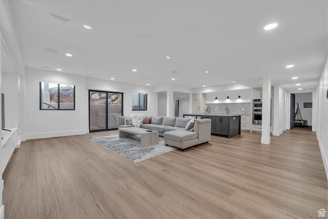 565 W Autumn Blaze, Woodland Hills, UT 84653 - living room with bar, baseboards, light wood-style floors, and recessed lighting