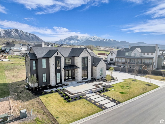 565 W Autumn Blaze, Woodland Hills, UT 84653 - view of front of property featuring a residential view, a chimney, fence, and a mountain view