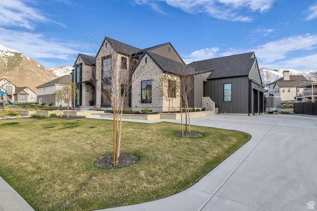 565 W Autumn Blaze, Woodland Hills, UT 84653 - french country home featuring a residential view, stone siding, board and batten siding, and a front yard