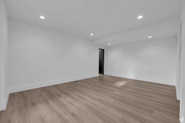 565 W Autumn Blaze, Woodland Hills, UT 84653 - unfurnished room featuring baseboards, light wood finished floors, and recessed lighting