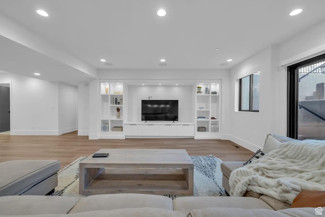 565 W Autumn Blaze, Woodland Hills, UT 84653 - living area featuring baseboards, wood finished floors, and recessed lighting