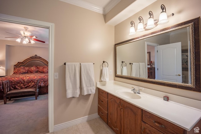 11855 S Cottage Side Way E, Draper, UT 84020 - bathroom with vanity, ensuite bath, crown molding, baseboards, and ceiling fan