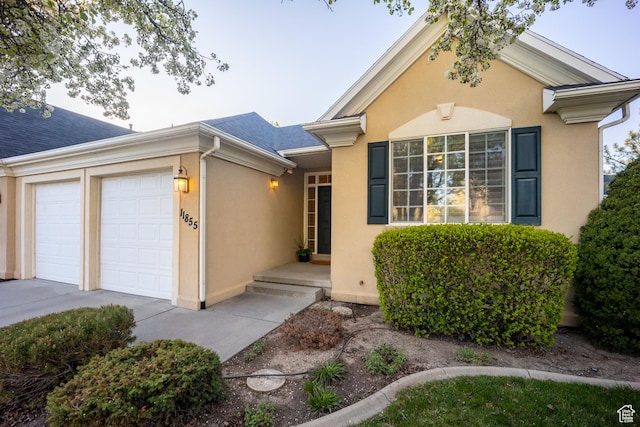 11855 S Cottage Side Way E, Draper, UT 84020 - ranch-style home featuring stucco siding, an attached garage, and concrete driveway