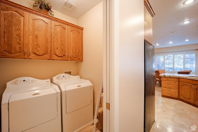 11855 S Cottage Side Way E, Draper, UT 84020 - laundry area featuring visible vents, washer and clothes dryer, recessed lighting, and cabinet space