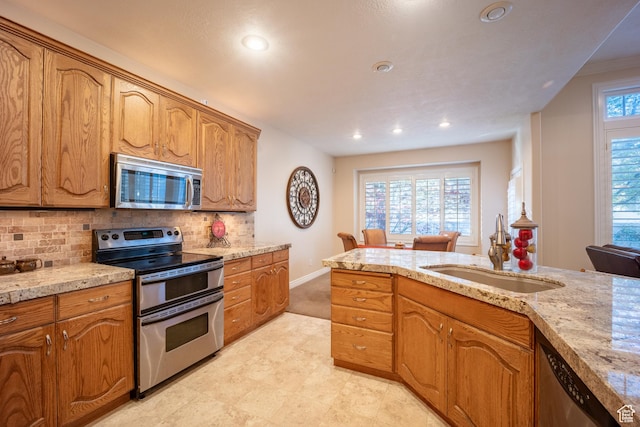 11855 S Cottage Side Way E, Draper, UT 84020 - kitchen with recessed lighting, appliances with stainless steel finishes, decorative backsplash, and a sink