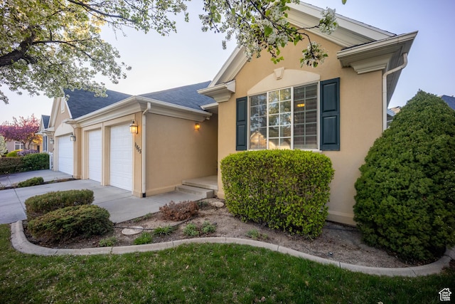 11855 S Cottage Side Way E, Draper, UT 84020 - ranch-style home featuring an attached garage, driveway, roof with shingles, and stucco siding