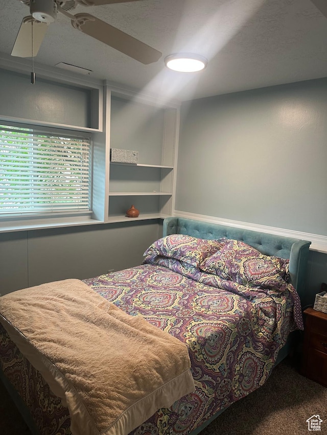 bedroom with carpet floors and ceiling fan