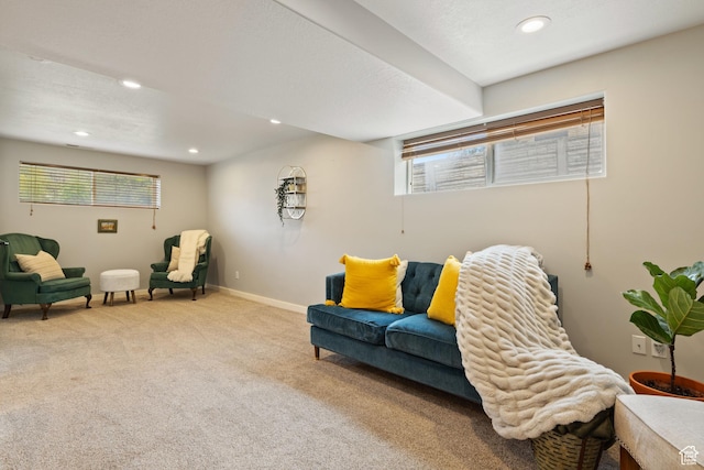 living area featuring baseboards, carpet floors, and recessed lighting