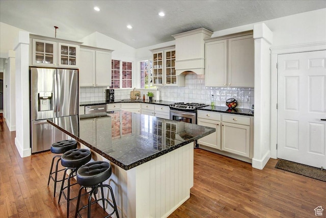 857 E Park School Rd, Draper, UT 84020 - kitchen featuring glass insert cabinets, a sink, dark wood-type flooring, and appliances with stainless steel finishes