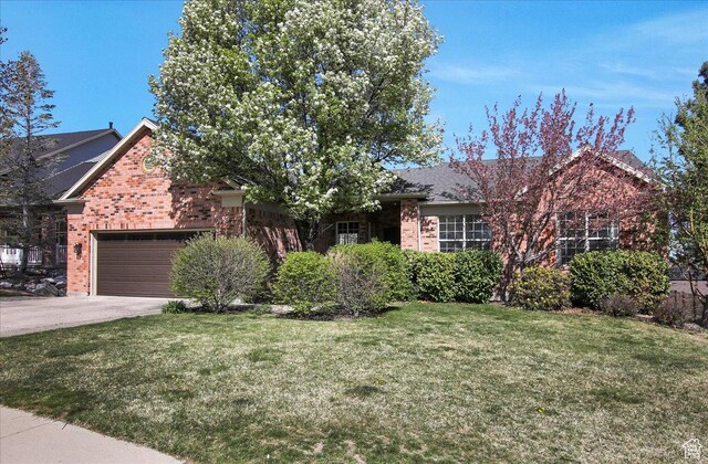 857 E Park School Rd, Draper, UT 84020 - ranch-style home with a front lawn, brick siding, driveway, and a garage