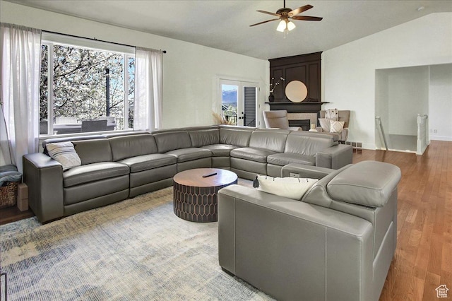 857 E Park School Rd, Draper, UT 84020 - living area featuring a ceiling fan, wood finished floors, a fireplace, lofted ceiling, and visible vents