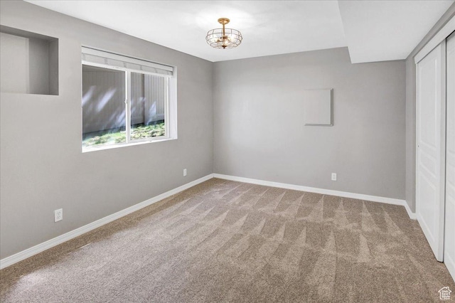 857 E Park School Rd, Draper, UT 84020 - carpeted spare room featuring baseboards and a chandelier