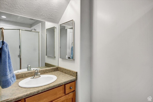 857 E Park School Rd, Draper, UT 84020 - full bathroom with vanity, a textured ceiling, and a shower stall