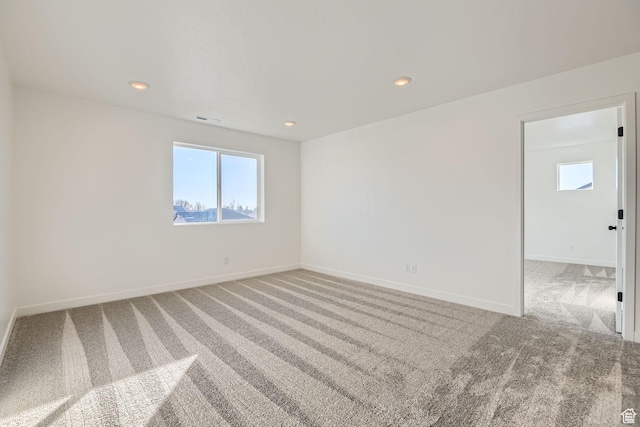 251 E Montgomery Ln, North Ogden, UT 84414 - carpeted spare room with plenty of natural light, baseboards, visible vents, and recessed lighting