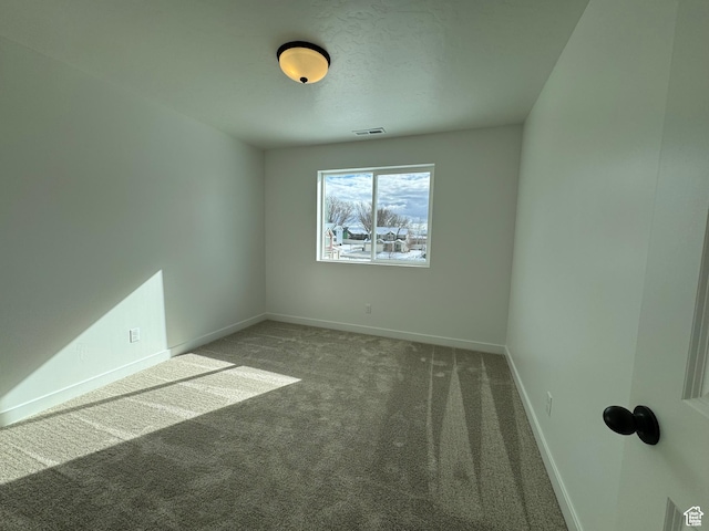 251 E Montgomery Ln, North Ogden, UT 84414 - carpeted empty room featuring baseboards and visible vents