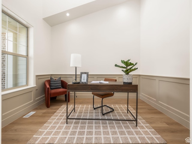 1554 S 920 E, Salem, UT 84653 - office featuring visible vents, wainscoting, wood finished floors, and a decorative wall
