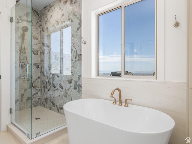 1554 S 920 E, Salem, UT 84653 - full bath featuring tile walls, a soaking tub, a stall shower, and a sink