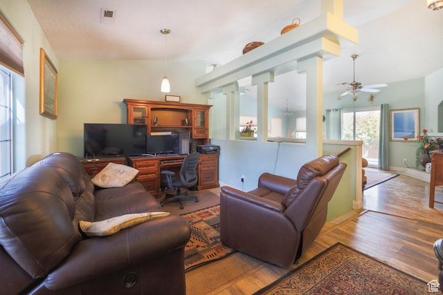 2201 S San Carlos Ct, Bloomington, UT 84790 - living area featuring ceiling fan, vaulted ceiling, wood finished floors, and visible vents