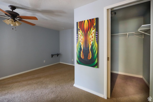2201 S San Carlos Ct, Bloomington, UT 84790 - unfurnished bedroom with a ceiling fan, baseboards, and carpet