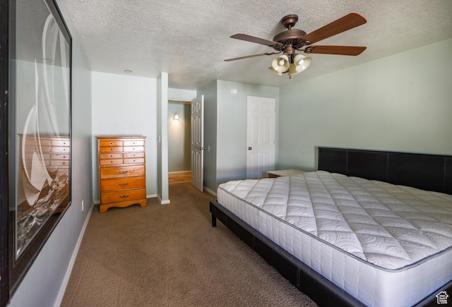 2201 S San Carlos Ct, Bloomington, UT 84790 - bedroom featuring baseboards, carpet, a textured ceiling, and ceiling fan