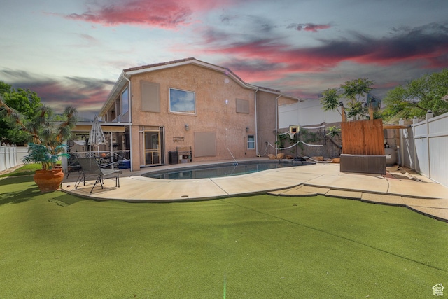 2201 S San Carlos Ct, Bloomington, UT 84790 - pool at dusk with a fenced backyard, a patio area, and a fenced in pool