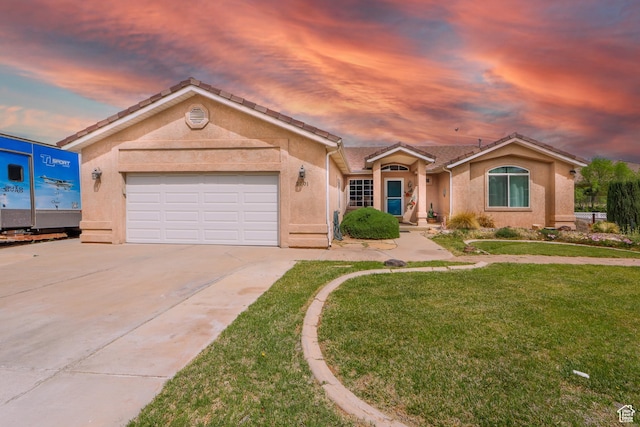 ranch-style home featuring a front lawn, stucco siding, an attached garage, a tile roof, and driveway