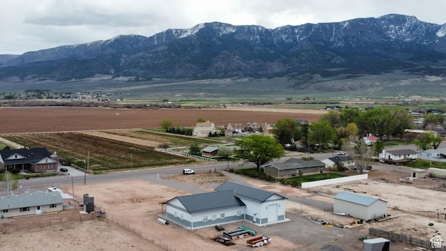 birds eye view of property featuring a rural view and a mountain view