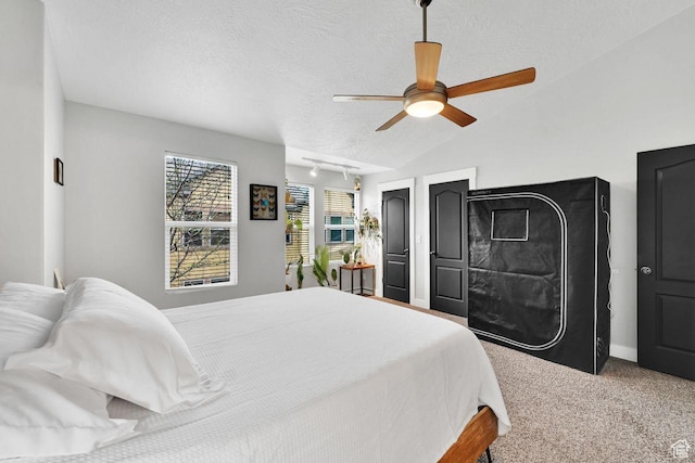 3708 S Luchars Ln W, Salt Lake City, UT 84115 - carpeted bedroom featuring ceiling fan, vaulted ceiling, a textured ceiling, and baseboards