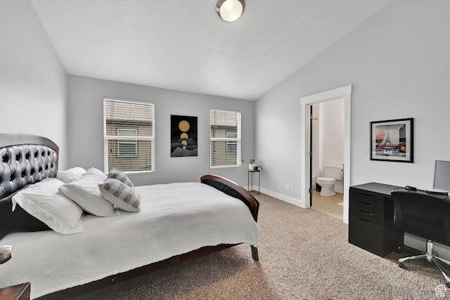 3708 S Luchars Ln W, Salt Lake City, UT 84115 - carpeted bedroom featuring baseboards, vaulted ceiling, ensuite bath, and a textured ceiling