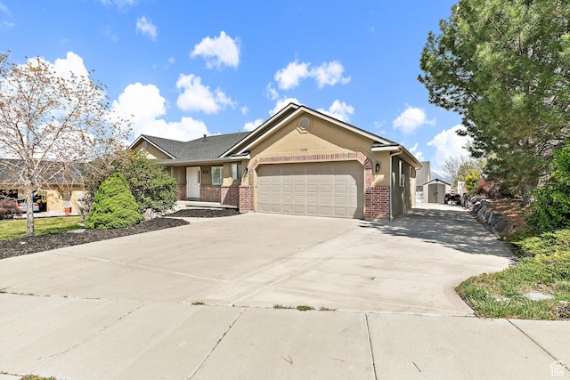 1354 S Star Cir W, Saratoga Springs, UT 84045 - single story home featuring stucco siding, an attached garage, brick siding, and driveway