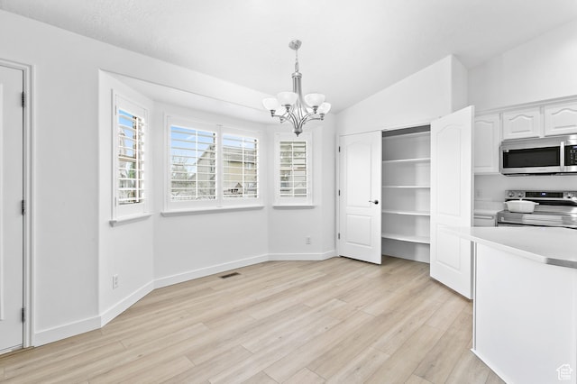 1354 S Star Cir W, Saratoga Springs, UT 84045 - unfurnished dining area featuring baseboards, a chandelier, visible vents, and light wood-style flooring