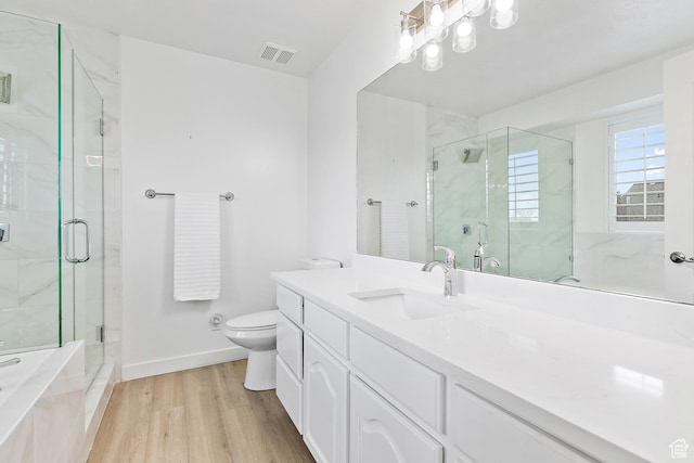 1354 S Star Cir W, Saratoga Springs, UT 84045 - bathroom featuring wood finished floors, visible vents, a marble finish shower, and toilet