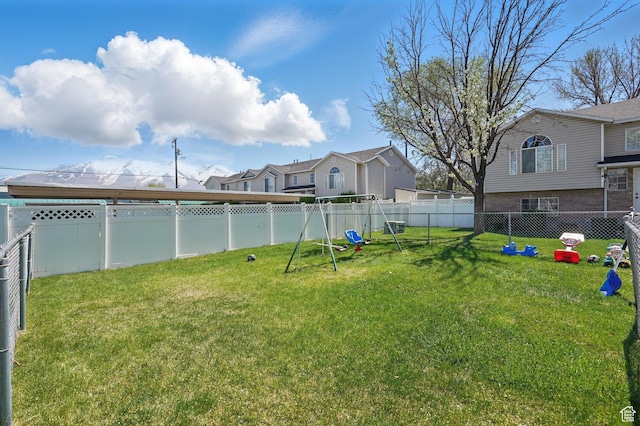 314 E 1000 N, Spanish Fork, UT 84660 - view of yard featuring a residential view, a fenced backyard, and a playground