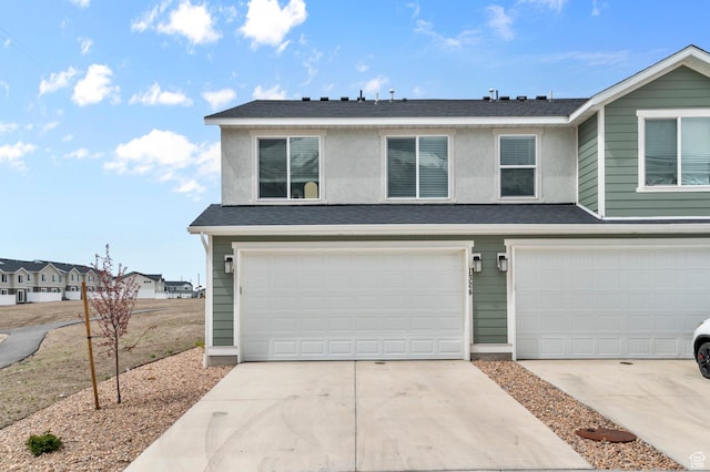 1324 S 3610 E, Spanish Fork, UT 84660 - view of front of property featuring an attached garage, a shingled roof, and driveway