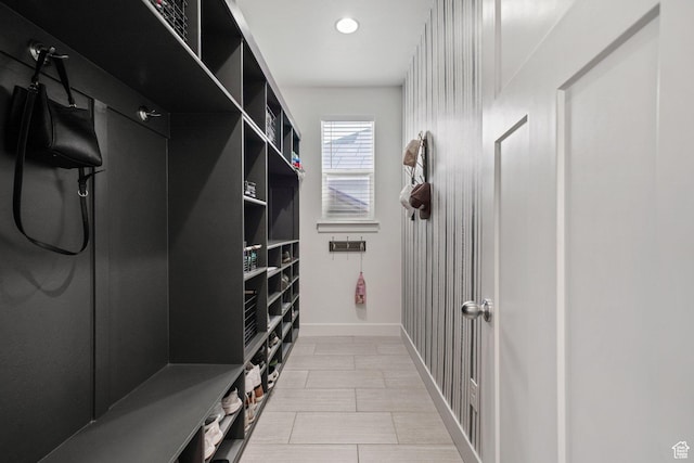 mudroom featuring baseboards and recessed lighting