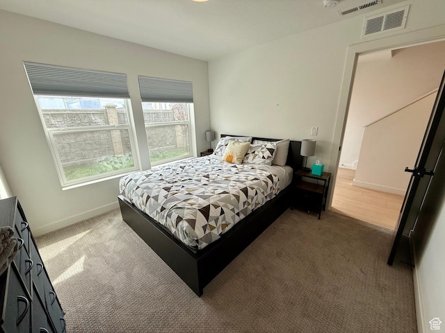 1739 S Main St E Unit 9, Salt Lake City, UT 84115 - carpeted bedroom with baseboards and visible vents